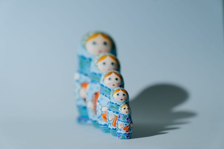 A set of traditional Russian nesting dolls, also known as Matryoshka, with vibrant colors and intricate designs.